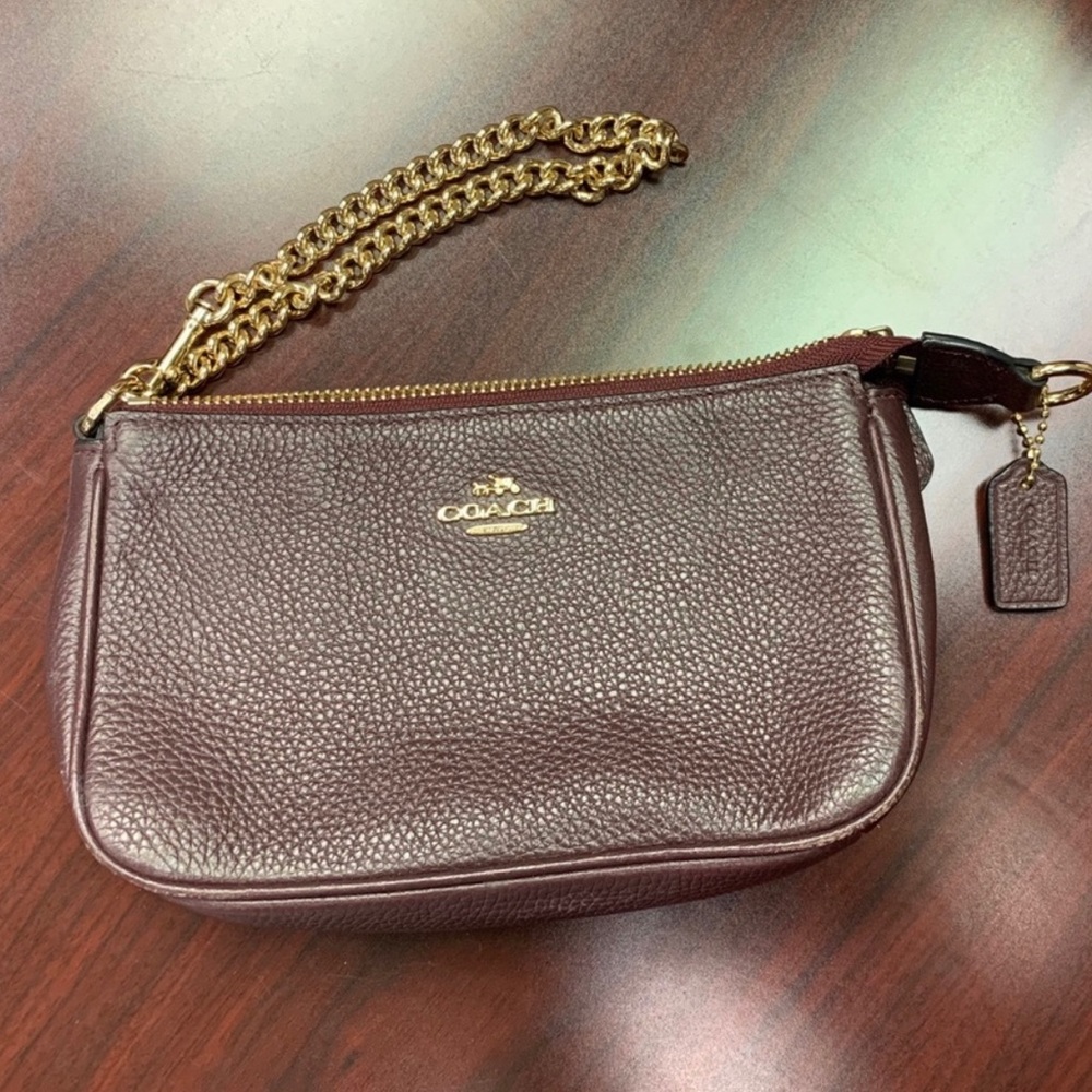 Coach plum wristlet